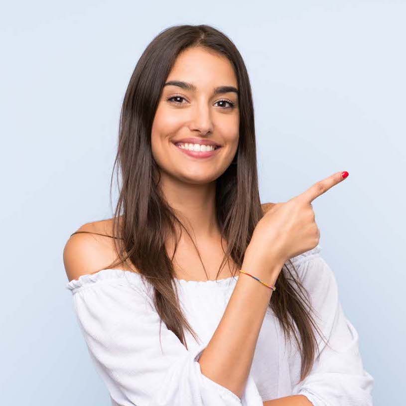Young,Woman,Over,Isolated,Blue,Background,Pointing,Finger,To,The